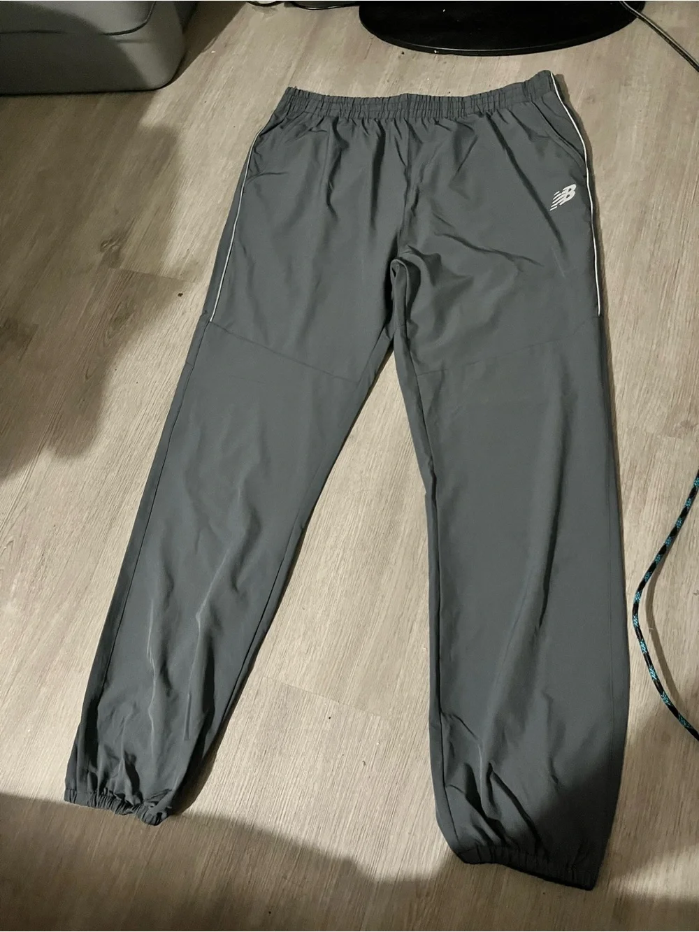 New Balance Black/Gray track joggers with White Logo and Stripe Accents